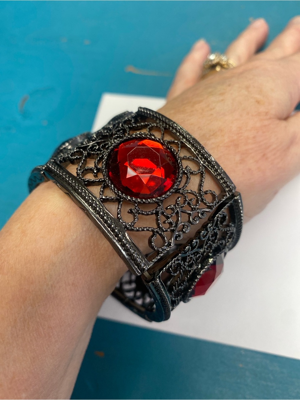 Black Filigree Cuff Bracelet with Red Gemstone